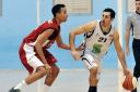 Alejandro Navarro, right, scored a useful 21 points for the Dragons
