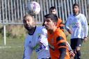 Adeeb Jawad, right, netted a hat-trick for Girlington in their 3-1 Spen Valley Memorial Trophy victory over Savile Youth