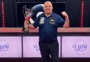 Chris Melling lifts the Champions League Pool trophy on Monday night. Picture: Ultimate Pool.