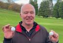 Paul Hayhurst proudly shows off his two hole-in-one balls. Picture: Adrian Weaver (Bingley St Ives club secretary).