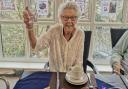 Sally Slaven raises a glass on her 100th birthday