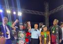 Tasif Khan (red shorts) celebrates becoming WBC Silver Super Flyweight champion