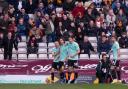 Crawley celebrate scoring during their latest win at Valley Parade