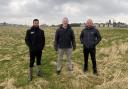 Rohan Corriette, solar project manager at G&H Group; John Sharp, James Bushell, Bradford City Council energy team, at the proposed Odsal solar farm site