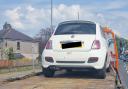 Police seized this white Fiat 500