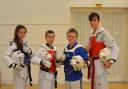 Horizon Taekwondo Academy's Commonwealth Championship quartet. From left, Ellie Bowden, Jamie Simpson-Kidd, Kieran Young and Thomas Henley