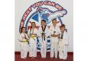 Rebecca Weir, centre, led the Quest Taekwondo team at the 1-1 Ultimate competition in Dewsbury – Picture: Karl Mann