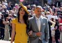 George and Amal Clooney arrive at St George's Chapel at Windsor Castle for the wedding of Meghan Markle and Prince Harry. PRESS ASSOCIATION Photo. Picture date: Saturday May 19, 2018. See PA story ROYAL Wedding. Photo credit should read: Chris