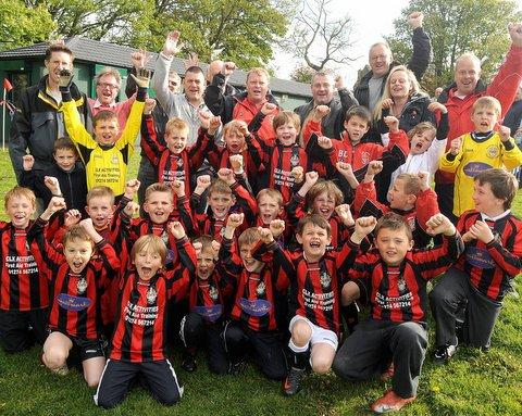 Young Bingley Juniors footballers joined club officials, councillors and Council staff for the opening of a new sports facilities at Gilstead recreation ground. 
The new building includes changing and store rooms, showers and a food preparation room.