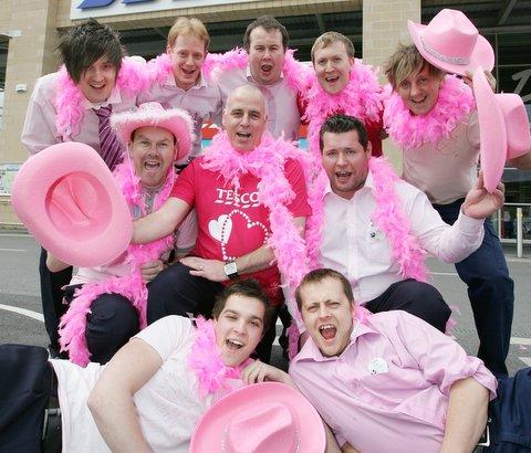 Male staff at Skipton’s Tesco showed their sensitive sides and dressed in pink for charity. 
A record number of female staff at the store are taking part in Sunday’s Race for Life in aid of Cancer Research UK. 