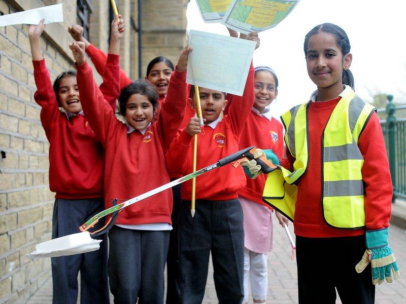 Bradford primary school pupils were rewarded for helping to improve their neighbourhood. 
About 60 pupils at Farnham Primary School, Horton Grange, received certificates for taking part in a day of action with Bradford Council. 
