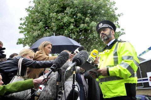 Assistant Chief Constable Jawaid Akhtar reads a statement to the media close to the scene in Shipley where a body was found in the River Aire.