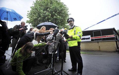 Assistant Chief Constable Jawaid Akhtar reads a statement to the media close to the scene in Shipley where a body was found in the River Aire.