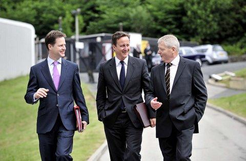 Prime Minister David Cameron and Deputy Prime Minister Nick Clegg are greeted at odsal by Bradford Bulls' chairman Peter Hood.