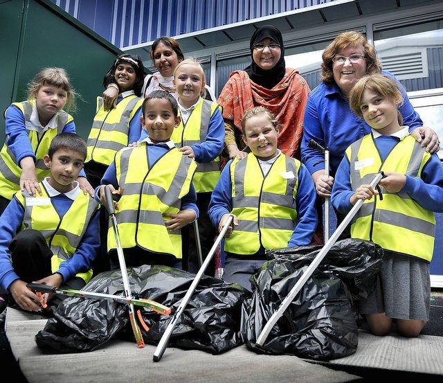 Pupils at Fagley Primary School got stuck in to keeping the streets around their school tidy ahead of a celebration of their eco-warriors project. 