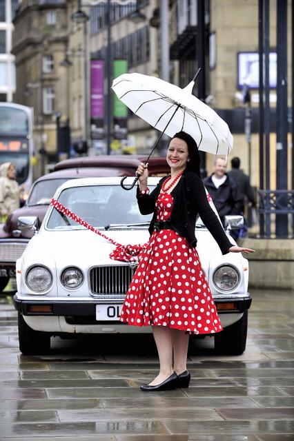 Nic Jones from Lady Penelope cars with her vintage Jaguar at the Bradford Classic 2010 event in Centenary Square