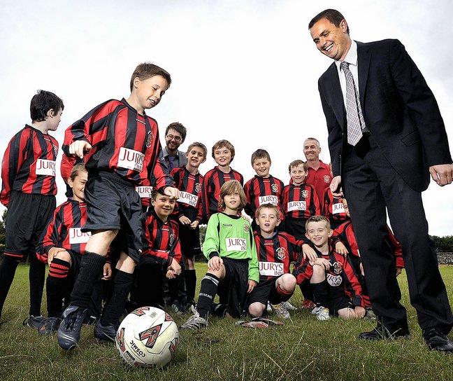 A new hotel about to open in Bradford city centre has sponsored a local junior football club. 
Bingley Juniors received their new kit from Roger Clark-Coates, general manager of Jurys Inn.
