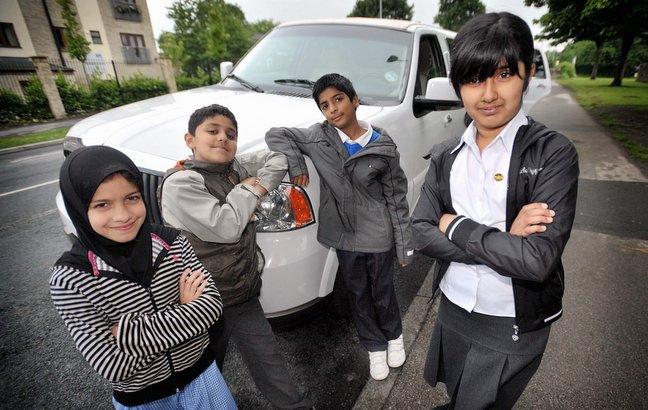 More than 300 children who recorded full attendance at school over a full term this year have cruised around their neighbourhoods in a limousine as a reward. 
Half-hour trips were given to groups of children at Heaton Primary School, in Bradford. 
