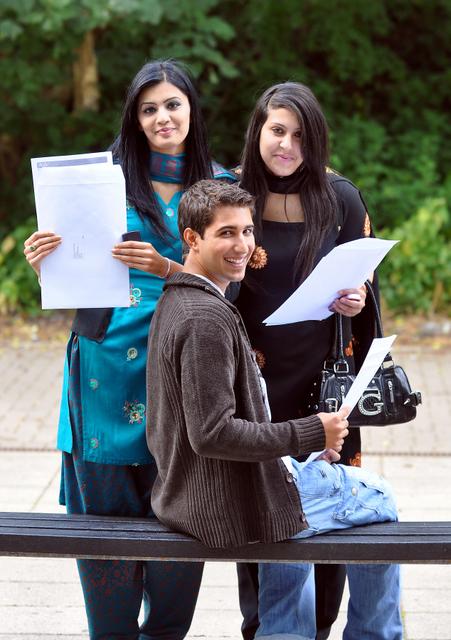 A-level students Ummera Ahmed, Sermed Mezher and Iram Hussain with their results at Challenge College.
