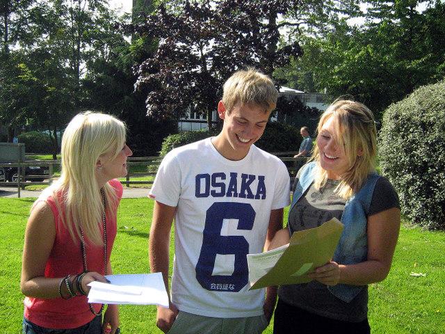 Oakbank School students Jodie Healey, Jack Lonsdale and Hayley Williams with their results