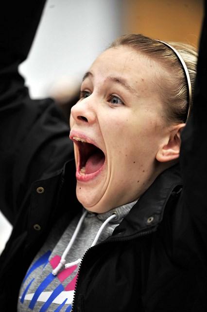 A joyful student at Bradford Academy reacts to her GCSE results
