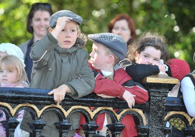 Hundreds of children in their Victorian Sunday best welcomed distinguished guests to a re-enactment of the original opening of a Roberts Park at Saltaire. 