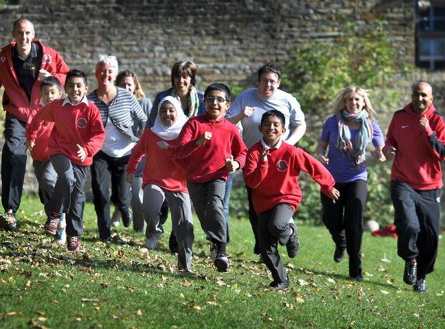 A dozen staff and a group of pupils at Springwood Community Primary School, in Manningham, are collecting sponsorship before taking on the 5k fun Bradford City Fun Run in Lister Park.