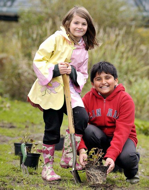 Baildon schoolchildren added a splash of colour to Roberts Park, Saltaire. Marigold and wild flower bulbs were planted by the pupils at Glenaire Primary School.
