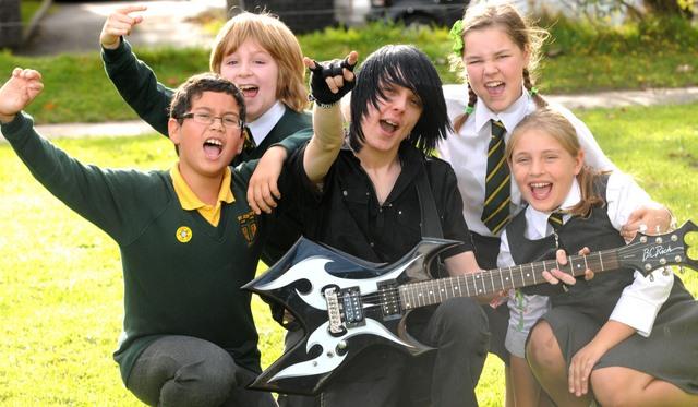 Pupils at St Joseph's Catholic Primary School, Otley, take part in a rock school. Pictured are Shaun Street, Joel Cacciola, guitarist Steven Brodowski, Emily Broswell and Freya Gustafson.