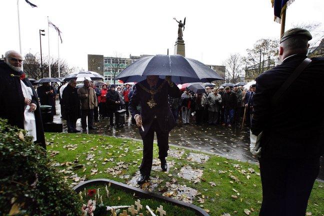 Keighley Town Mayor, Councillor Ian Wilson, places a cross in Town Hall Square, Keighley, during the Remembrance Day service.