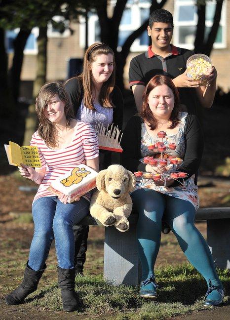 Students from Queensbury Shool are holding events to raise money for Children in Need.  Pictured running the Bake, Raffle, Name the Dog and Quiz are, from the left, Emma Copeland, Rebecca McBride, Katie Wainwright and Anand Lad.