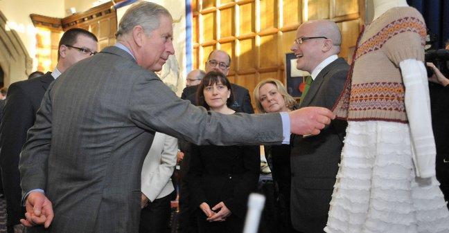 Prince Charles meets representatives of the Bradford wool trade.