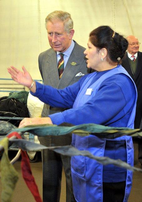 Prince Charles chats to Satoo Kaur during his visit to Bulmer and Lumb.