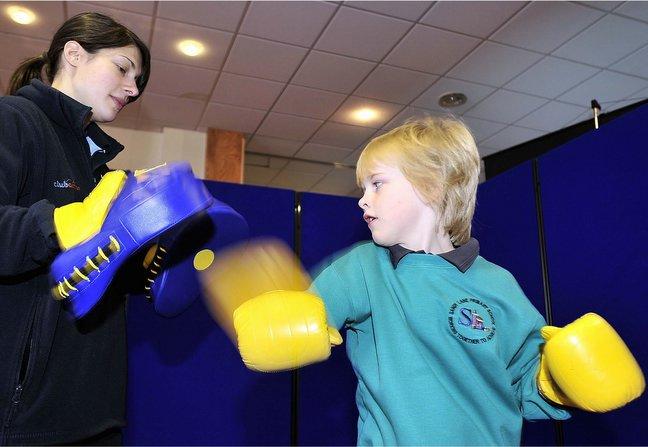 Pupils from Sandy Lane Primary School, including Lewis Day. were among more than 600 young people, aged from five to 18, got health-wise when they joined in an interactive day of events run by the NHS.