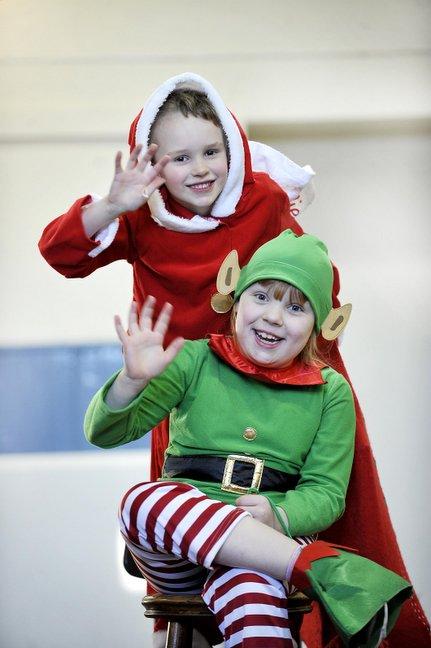 Taking part in Wilsden Primary School Nativity 'A Special Kind of Present' were, from the left, William Dawson as Santa and Jessica Thompson as Elf.