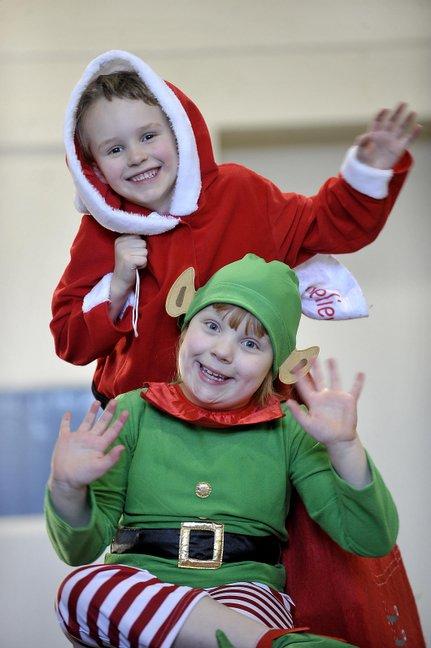 Taking part in Wilsden Primary School Nativity 'A Special Kind of Present' were, from the left, William Dawson as Santa and Jessica Thompson as Elf.