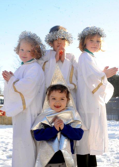 Appearing in Thornton Primary School and Children's Centre Nativity were, from the left, back, Scarlet Clayton, 5, Angel Harris, 5, and Freya Horner, 5, and front Amy Lawrence, 5.