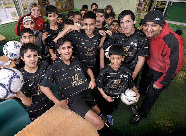 A young Bradford football team is taking great pride in its new kit. 
The under-13s squad at Manningham All-Stars have been sponsored by Bradford firm 24/7 Scaffolding. 