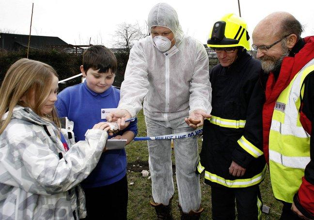 A mock ‘crash landing’ scene was used to inspire primary school children. 
Pupils at Eastburn Primary, Keighley, were taken to see a mysterious sight on their school’s playing field and then encouraged to write about their experience. 
