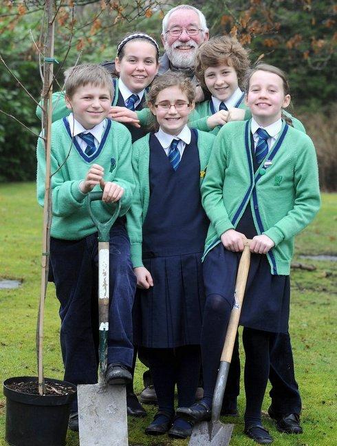 Children in their final year at a Bingley school have planted a tree in the playing field as a reminder of their time there.
The pupils at Lady Lane Park School were joined by the Reverend Canon Paul Bilton, who gives assemblies at the school.
