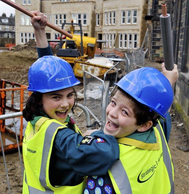 Scouts from a Menston troop have earned their DIY badges after some special on the job instructions.    
The 27 youngsters were invited to Menston Hall for the day by the Strategic Team Group, which is converting the building into 30 flats. 
