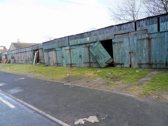 A row of vacant garages at Dartmouth Terrace.