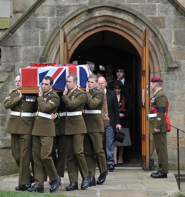 Colleagues of Private Martin Bell, carry his coffin out of Bradford Cathedral following his funeral service