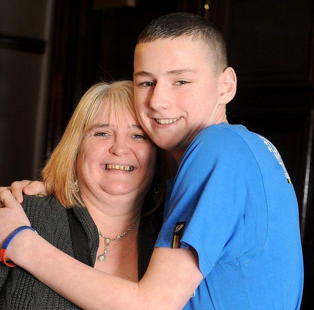 Coran Oxley, winner of the Outstanding Achievement Award and the Make a Positive Contribution 11-25 Years Award, with his mum Michelle.
