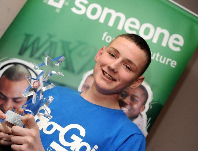 Coran Oxley, winner of the Outstanding Achievement Award and the Make a Positive Contribution 11-25 Years Award.