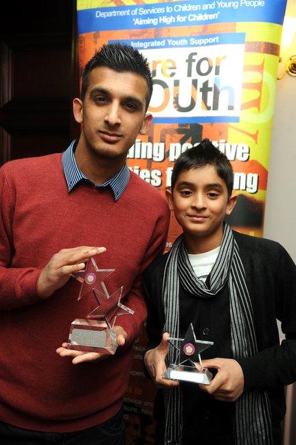 Grosvenor Youth Committee members Adil Tanvir, left, and Qasim Mohammed, 13,  with the Be Healthy 11-25 Years Award.