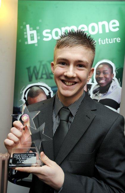 Lewis Birkenshaw with the Enjoy and Achieve 11-25 Years Award.