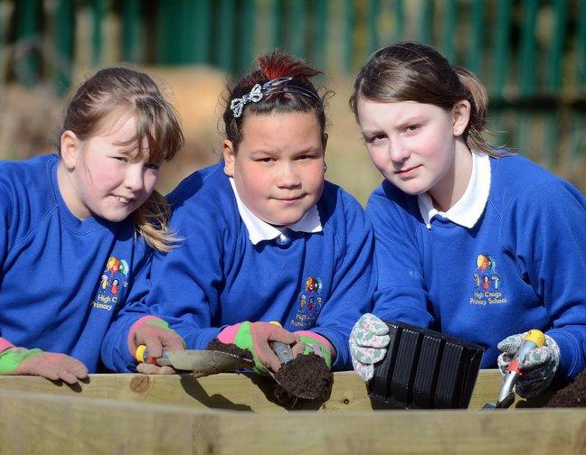 Spades were at the ready for the High Crags Goes Green project at the Shipley primary school.
It may have been a blustery day, but pupils dug in to plant vegetables in the school grounds.