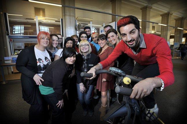 Raj Hussain, a cashier at the Barclays Bank in Bradford, is pedalling away to raise money for Red Nose Day, with the support of his friends and colleagues.