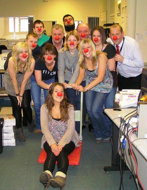 Telegraph & Argus Newspaper Sales staff join in the fun.